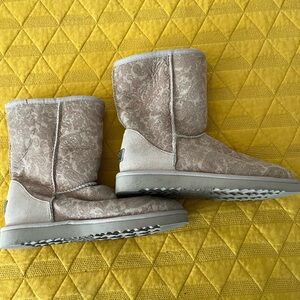 Limited edition slightly used UGG womens boot. Size 7
